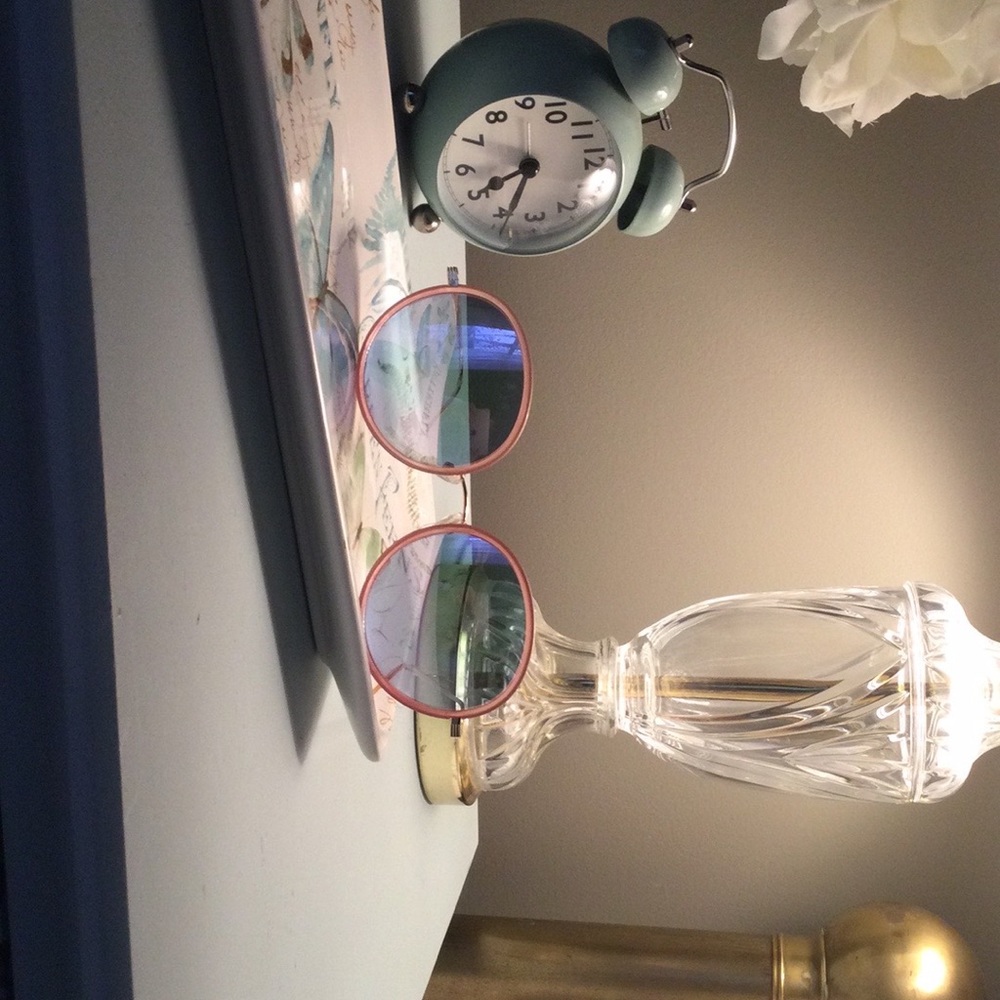 Loft sunglasses with pink frames, mirrored lenses and gold trim.